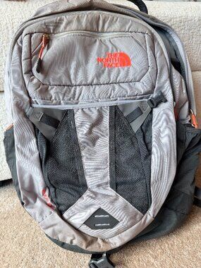 heather gray and metallic silver north face backpack Borealis Luxe The huge main compartment holds all the books and binders needed for a day on campus The North Face Dyno Backpack